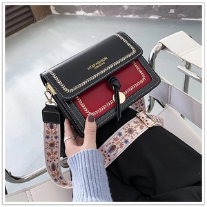 Black and red PU leather square bag with ethnic wide strap and gold embroidery detail