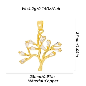 Detailed view of branch shaped gold copper pendant with cubic zirconia inlay and measurements