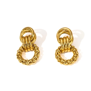 Detailed macro view of 18K gold-plated stainless steel earrings with beaded texture