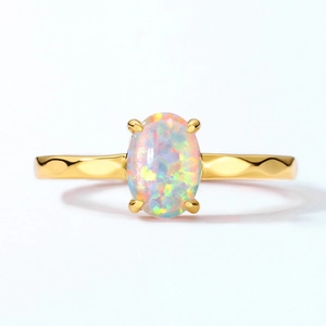 Minimalist 925 silver gold-plated ring with oval opal and hammered texture