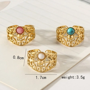 Detailed set of retro hollow engraved rings with pink, turquoise, and white stones