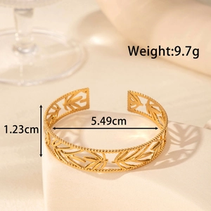 Golden hollow leaf pattern wide open cuff bracelet in stainless steel with measurements