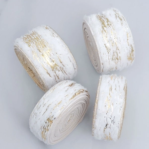 White faux fur ribbon rolls with gold marble foiling for DIY Christmas party decor
