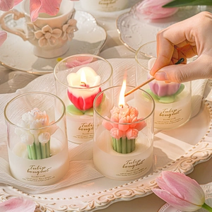 Tulip bouquet scented soy candle in glass cup with elegant floral candle carvings