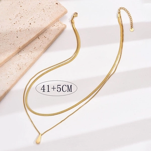 Detail showing gold double-layer chain dimensions of 41cm plus 5cm extension