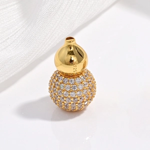 S925 sterling silver gourd pendant with sparkling pavé crystals on white silk background