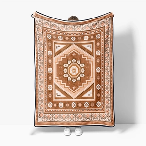 Detail of soft flannel blanket with bohemian geometric patterns and fine black edges