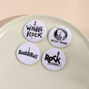 Cartoon tinplate badges set with I Wanna Rock and Stay Punk themes on white background