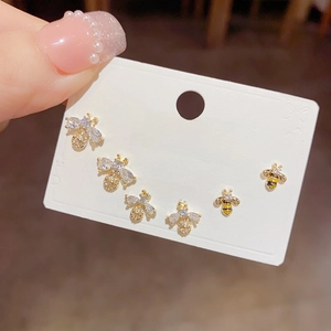Detailed view of three-piece golden bee stud earring set featuring Zircon and S925 silver needles