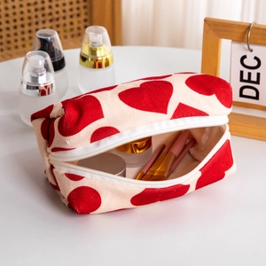Large capacity heart pattern cosmetic bag with brushes and skin care products