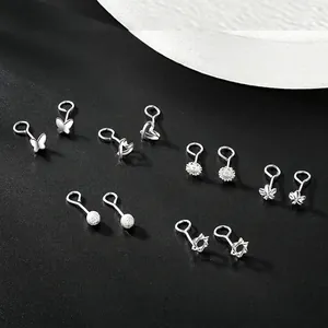 Polished S999 sterling silver stud earrings featuring butterfly, heart, and star charms