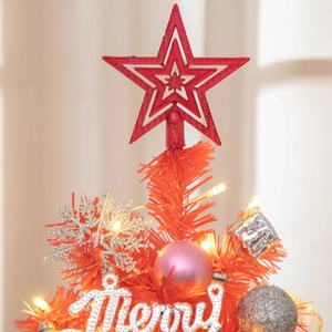 Close-up of 55cm mini Christmas tree top with red star, LED lights and festive ornaments