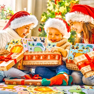 Children wearing Christmas hats showing cartoon animal DIY stickers near festive tree