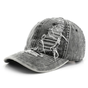 Distressed grey denim baseball cap with vintage frayed holes and washed finish for sun protection