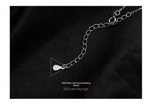 Macro shot of S925 sterling silver authenticity hallmark on necklace extension chain