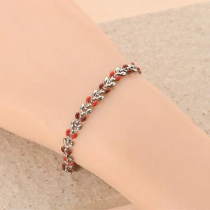 Women's leaf link bracelet with red enamel inlay on silver-tone metal chain
