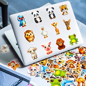 Close-up of cute cartoon animal stickers applied on a white laptop with various characters