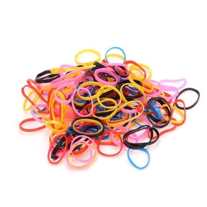 Detailed macro view of colorful elastic rubber bands for hair styling in mixed vibrant tones