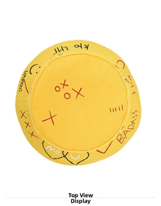 Top down view showing colorful graffiti letters and heart patterns on a yellow cotton bucket hat