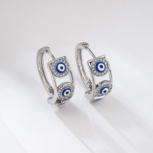 Silver evil eye huggie hoop earrings with micro-inlaid cubic zirconia and enamel eyes