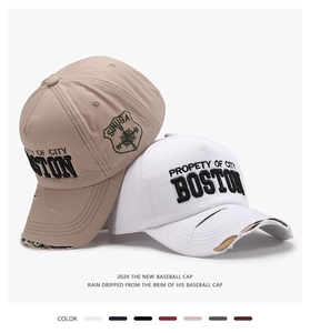 Detail of vintage BOSTON 3D embroidery and distressed cotton canvas on baseball cap