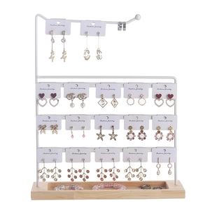 White metal 4-tier earring stand with wooden base for jewelry storage and display