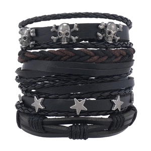 Bracciale punk da uomo con teschio e stella su cinturini intrecciati multistrato in pelle