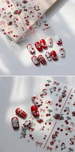 Macro detail of sweet cherry and strawberry nail stickers with cute red bow designs