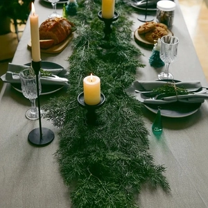 Green cypress table runner garland for Christmas dining decor and festive table setting