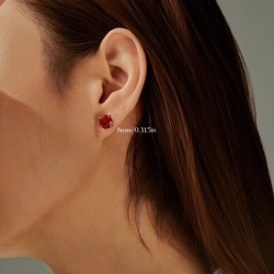 S925 sterling silver ear stud with 8mm red octagon rose cut stone on model's ear