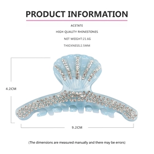 Blue shell-shaped acetate hair claw with rhinestones showing 4.2x9.2cm size details