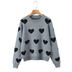 Women's crew neck grey sweater with black heart patterns and ribbed trims