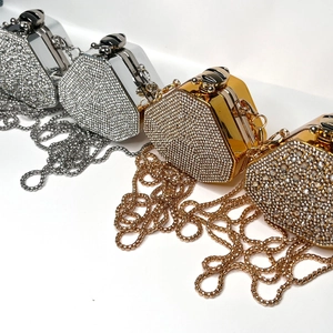 Elegant mini hexagonal evening bags with rhinestones in gold and silver finish with chains