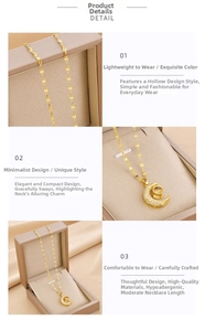 Close-up of gold moon necklace with zircon inlay and 100 languages projection stone