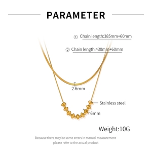 Detailed view of layered gold stainless steel necklace with size specifications