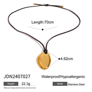 Detail showing 70cm black cord necklace and 4.62cm irregular gold stainless steel pendant