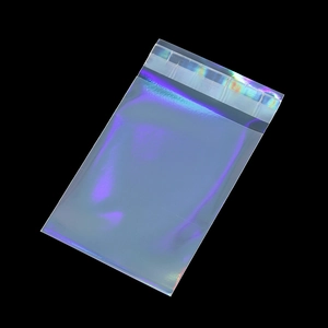 Close-up of holographic laser self-sealing bags with blue and purple iridescent gradients