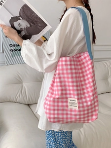 Pink gingham canvas tote bag with light blue straps and brand patch for women