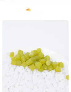 Macro shot of miniature green pickled bean cubes for DIY miniature food craft scenes