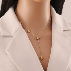 Elegant gold-plated stainless steel Y-shaped necklace with star pendants on female model