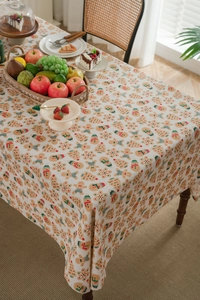 Macro detail of Christmas gingerbread man pattern on cotton linen festive tablecloth