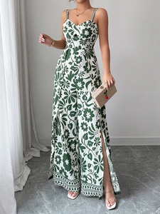 Detail of the elegant floral wide-leg jumpsuit with front twist cutout and high side slits