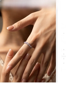 Detail of S925 silver ring featuring alternating purple and white gradient crystals