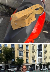 Detail of yellow studded hobo bag with metal eyelets and street style fashion view