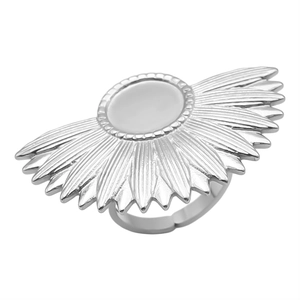 Macro detail of sunburst radial engraved silver stainless steel adjustable ring