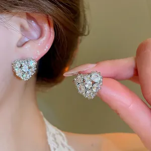 Sparkling 18k gold plated heart stud earrings with cubic zirconia for elegant women