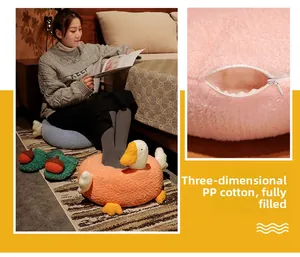 Detail showing the plump 3D PP cotton filling of this soft plush white goose cushion