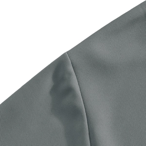 Close-up of grey polo shirt fabric showing fine mesh texture and durable stitching