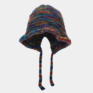 Detail of colorful chunky knit bucket hat with earflaps and long braided ties