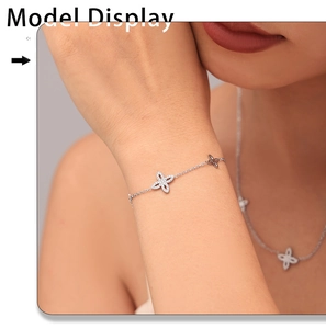 Detailed model shot of silver clover flower bracelet with sparkling zircon stones